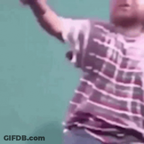 Man In Purple Shirt Dancing Arms Outstretched GIF