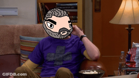 Man In Purple Shirt Eating Popcorn On Couch GIF