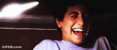 Man In Purple Shirt Laughing Open-Mouthed GIF