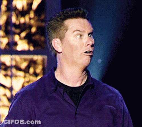 Man In Purple Shirt Making Face GIF
