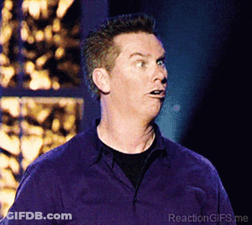 Man In Purple Shirt Making Funny Face GIF