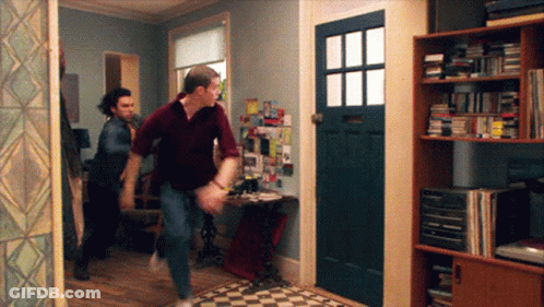 Man In Purple Shirt Running GIF