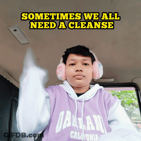 Man In Purple Shirt Saying California With Headphones GIF
