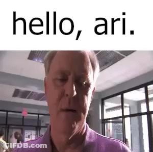 Man In Purple Shirt Saying Hello Ari GIF