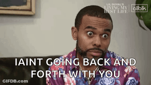 Man In Purple Shirt Saying I Aint Going Back And Forth GIF