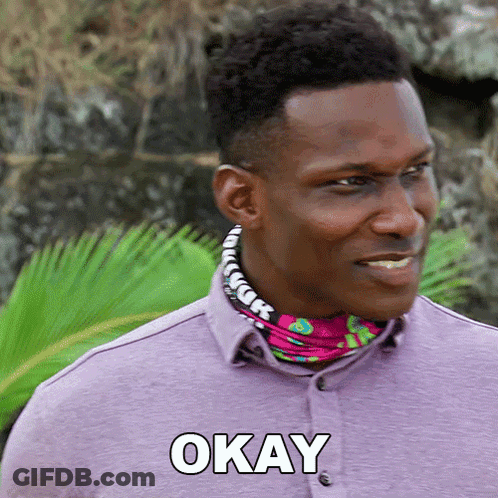 Man In Purple Shirt Saying Okay GIF