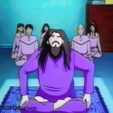 Man In Purple Shirt Sitting In Front Of Women GIF