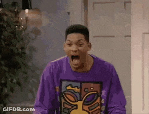 Man In Purple Shirt Standing With Mouth Open GIF