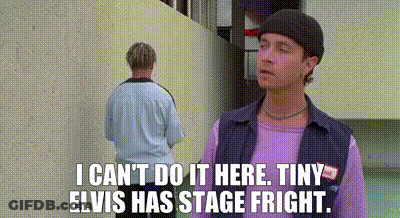 Man In Purple Shirt Talking To Man In Blue Shirt GIF