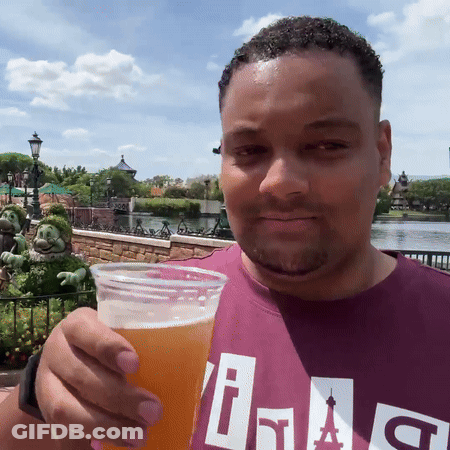 Man In Purple Shirt With Letter I GIF