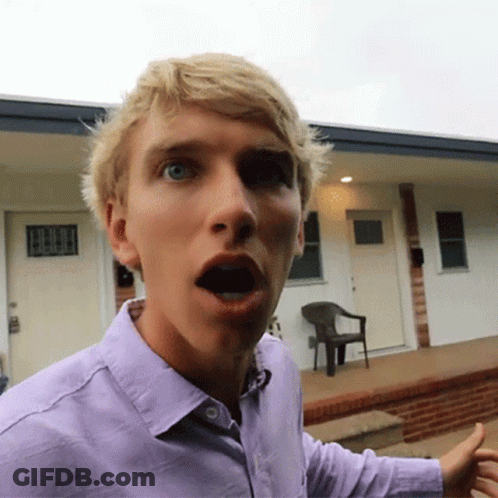 Man In Purple Shirt With Mouth Open GIF