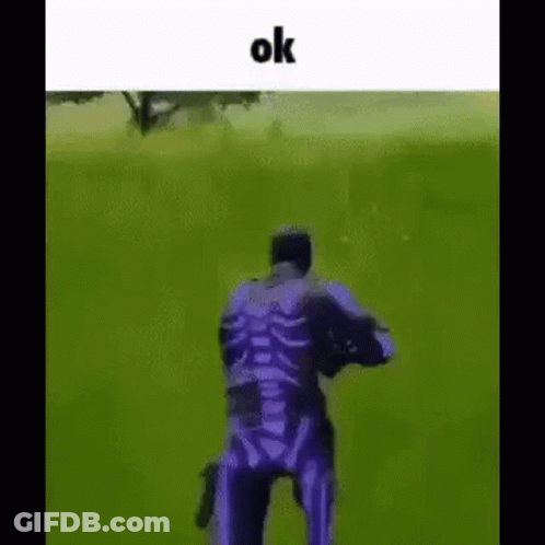 Man In Purple Skeleton Costume Holding Gun GIF