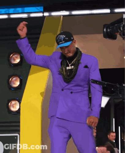Man In Purple Suit And Panthers Hat Dancing GIF