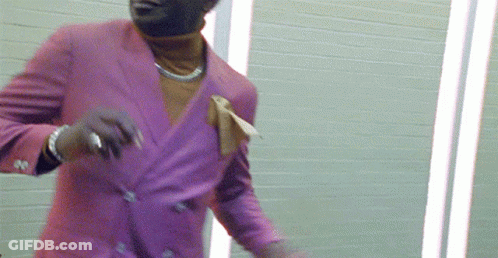 Man In Purple Suit Dancing GIF