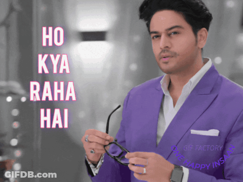 Man In Purple Suit Holding Glasses In Front Of Ho Kya Raha Hai Sign GIF