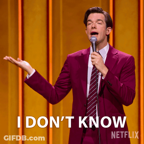 Man In Purple Suit Holding Microphone Saying I Don't Know GIF