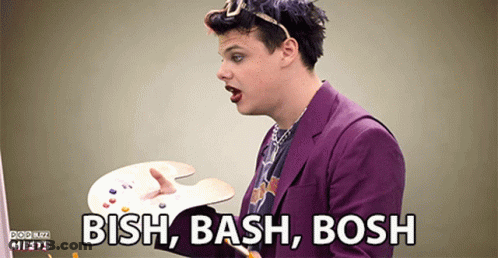 Man In Purple Suit Holding Palette Saying Bash Bash Bash GIF