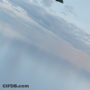 Man In Purple Suit Holding Puppet Talking To Little Girl GIF