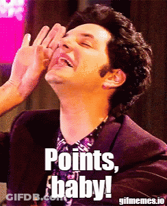 Man In Purple Suit Laughing Points Baby GIF