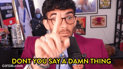 Man In Purple Suit Pointing Don't You Say A Damn Thing GIF
