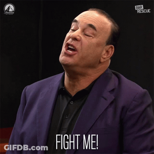 Man In Purple Suit Saying Fight Me GIF