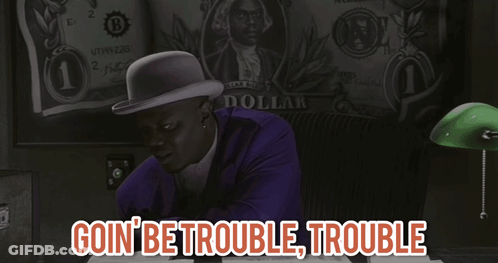 Man In Purple Suit Sitting In Front Of Dollar GIF