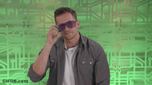Man In Purple Sunglasses On Green Background GIF