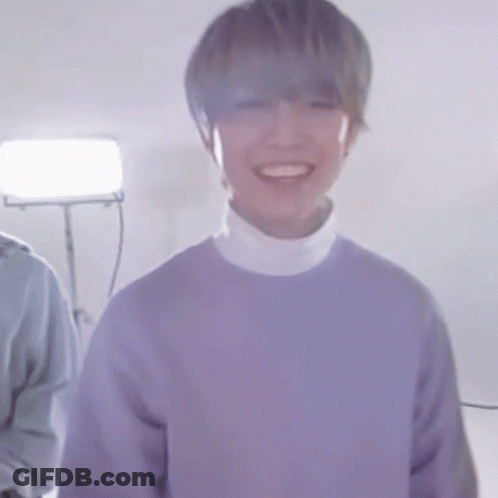 Man In Purple Sweater And White Turtleneck Smiling GIF