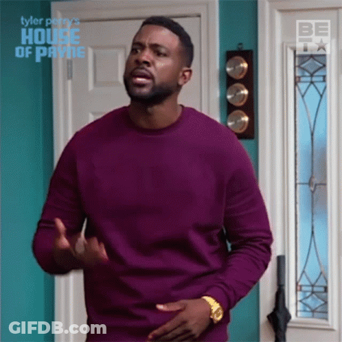 Man In Purple Sweater In Front Of House Of Payne Door GIF