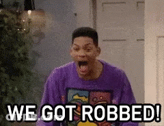 Man In Purple Sweater Saying We Got Robbed GIF