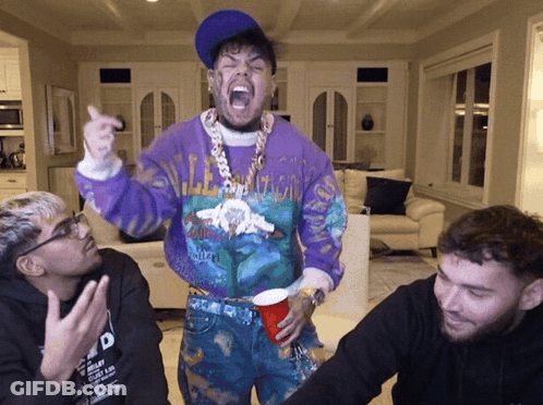 Man In Purple Sweater With California GIF