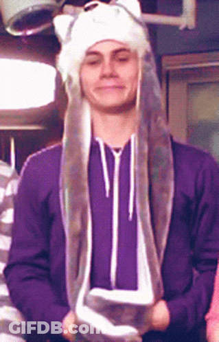 Man In Purple Sweatshirt And White Hat With Ears GIF