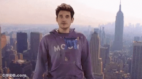 Man In Purple Sweatshirt Saying Moon GIF