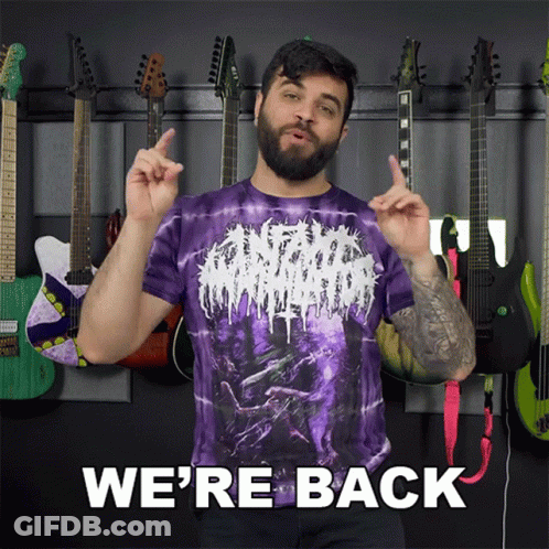 Man In Purple Tie Dye Shirt Saying We're Back GIF