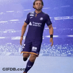 Man In Purple Triangle Jersey GIF