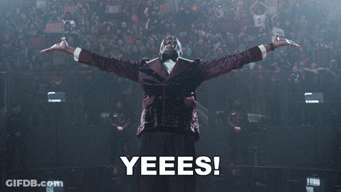 Man In Purple Tuxedo Saying Yeees GIF