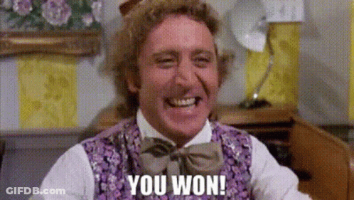 Man In Purple Vest And Bow Tie Saying You Won GIF