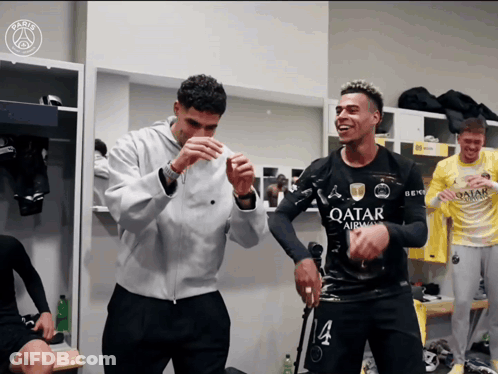 Man In Qatar Airlines Shirt Dancing With Another Man GIF