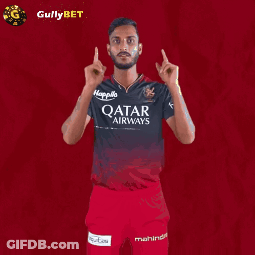 Man In Qatar Airways Jersey And Shorts GIF