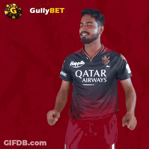 Man In Qatar Airways Shirt Holding Up Fingers GIF