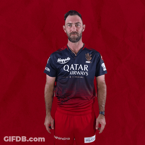 Man In Qatar Airways Shirt Pointing Up GIF