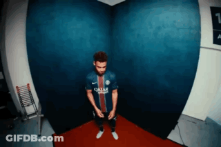 Man In Qatar Jersey Standing In Corner GIF