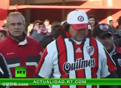 Man In Quilmes Jersey And Hat GIF