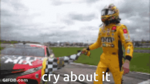 Man In Racing Suit Funny Face With NASCAR Logo GIF