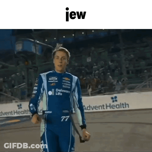 Man In Racing Suit Holding Stick GIF