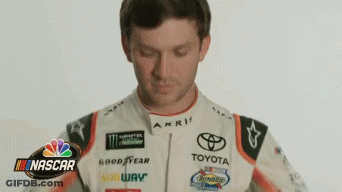 Man In Racing Suit NASCAR Sign GIF