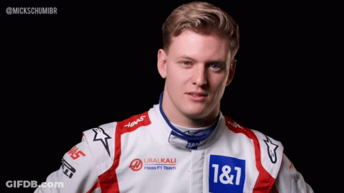 Man In Racing Suit With 1 & 1 GIF