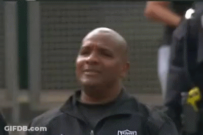 Man In Raiders Jacket Eyes Closed Looking At Camera GIF