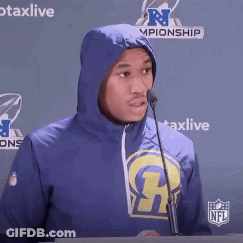 Man In Rams Hoodie At Microphone GIF