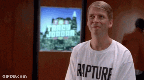 Man In Rapture T-Shirt In Front Of Tracy Jordan Screen GIF